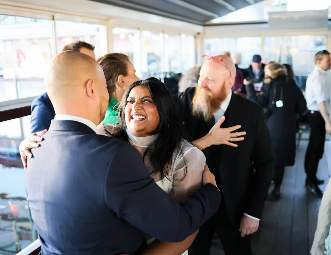 Friends hugging at an event